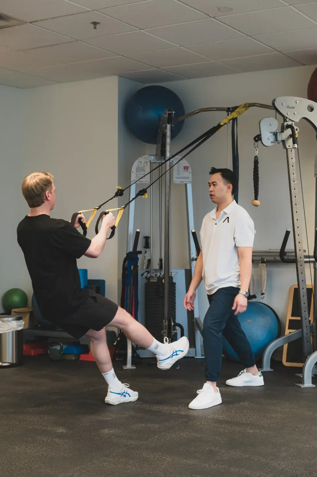 Patient performing guided exercise with physiotherapist
